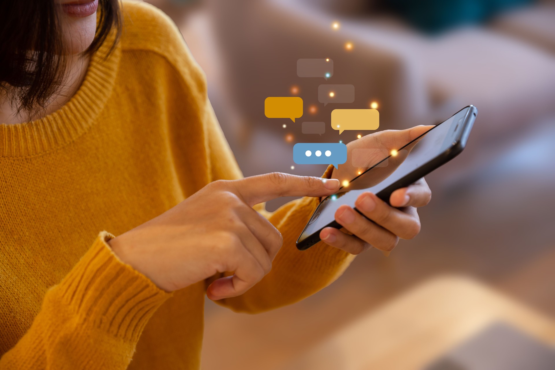 Hand of young woman using smartphone for chat and communication