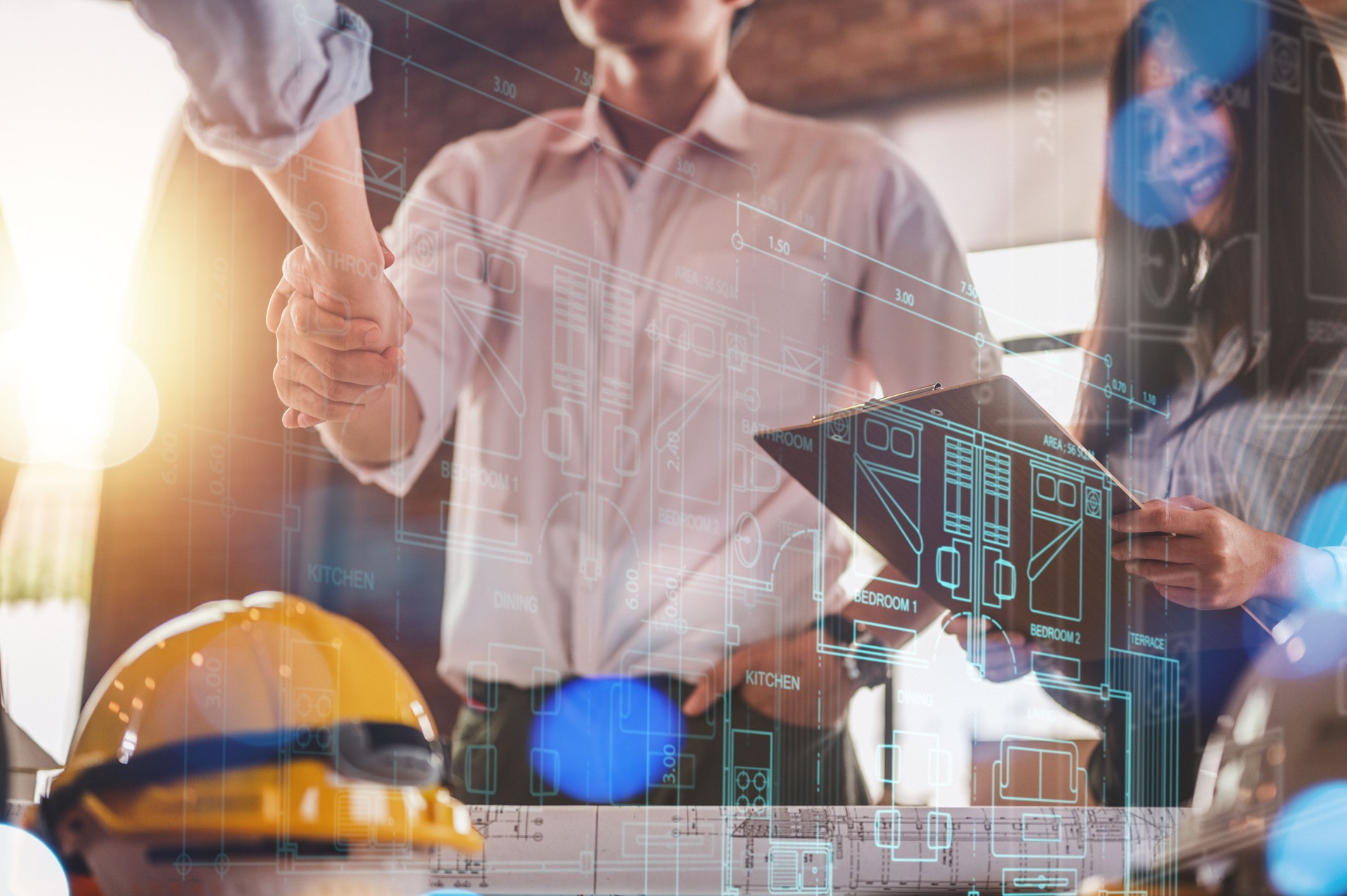 engineers and team shake hands around blueprint and structure with controller smart home hud.